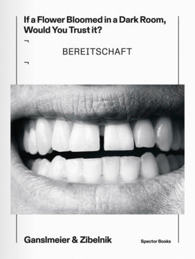 picture of the book cover showing an half open mouth with teeth