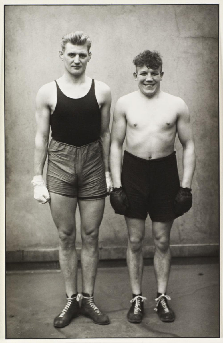 black and white portrait of two boxers in short pants