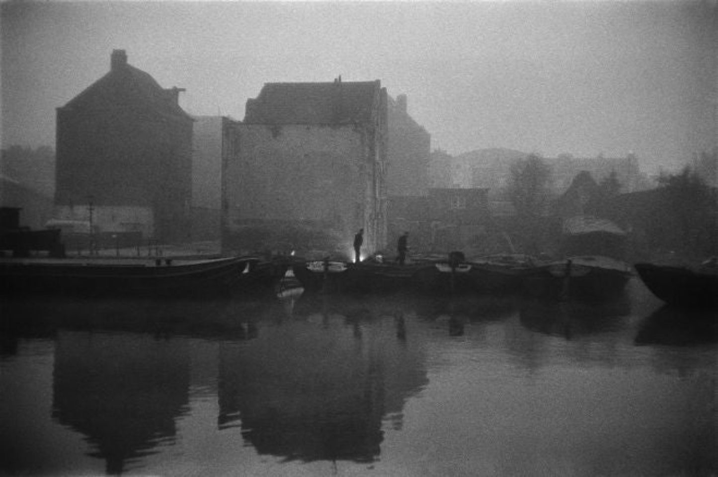 black and white amsterdam canal early morning