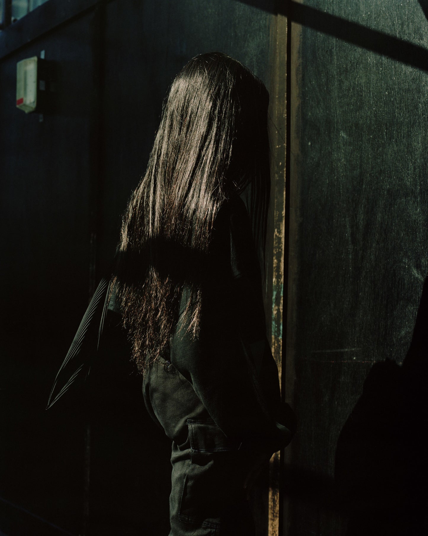 London woman black hair from behind