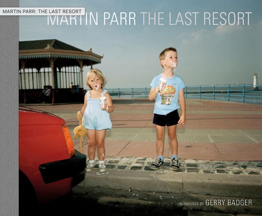 Cover colour photo with two kids eating icecream, with icecream on their face.