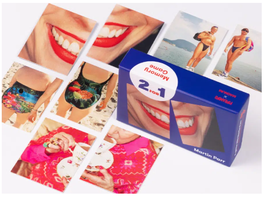 Blue box with Martin Parr memory game with four of the card sets.