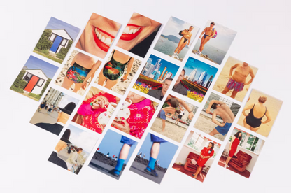 11 cards with colour photos of Martin Parr from the memory set, displayed diagonally