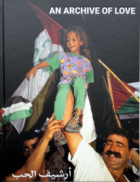 cover with young girl lifted by man with in the back the Palestinian flag