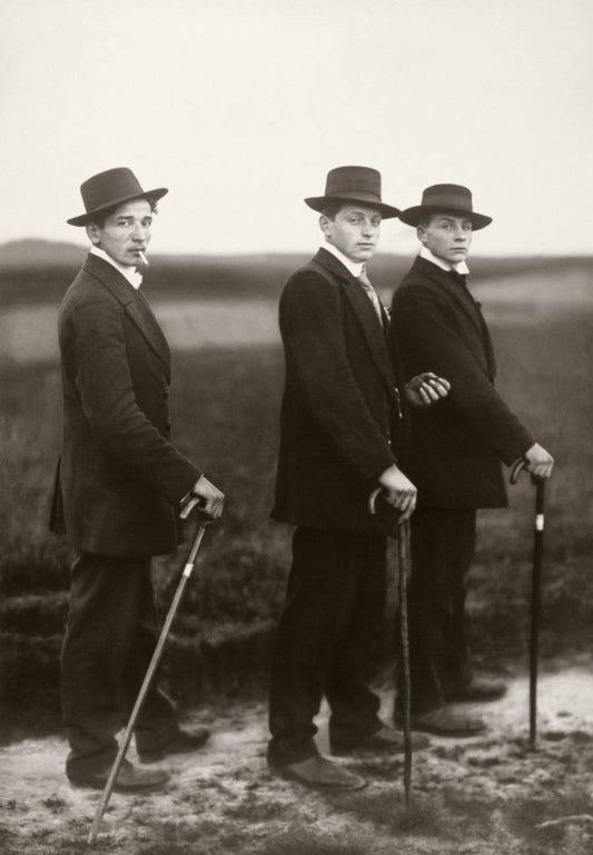 black and white portrait of three farmers in suits