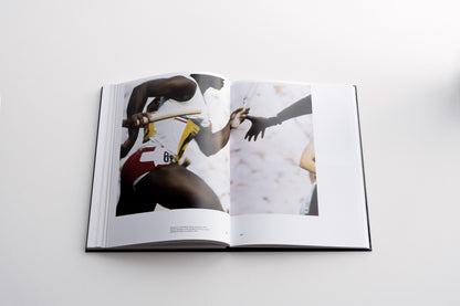 co rentmeester book spread two athletes in a relay