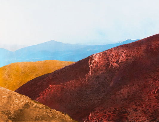 landscape mountains in blue, red and orange