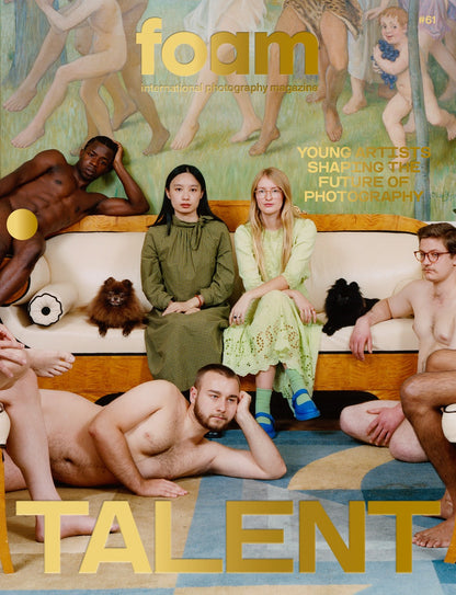 Front cover of Foam magazine #61, showing a group of indivuals, some dressed, some undressed, sitting on and around a sofa. 
