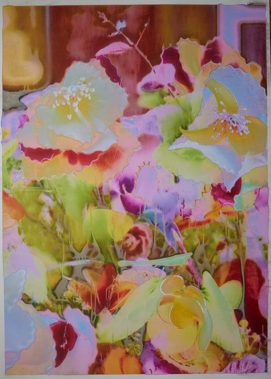 A vertical images of colourful flowers in yellow and pink tones.