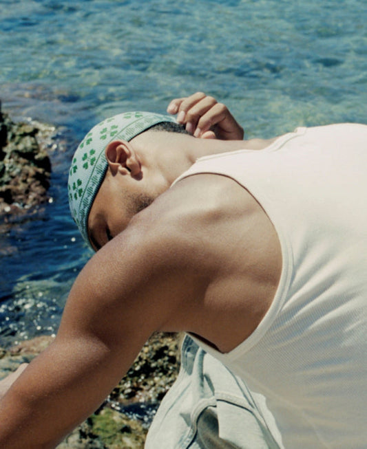 portrait of man at seaside, from the back