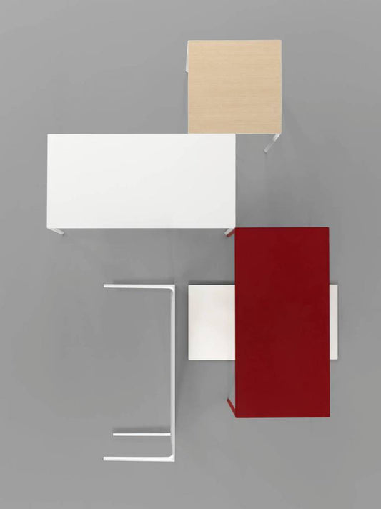 five tables photographed from above against a grey background